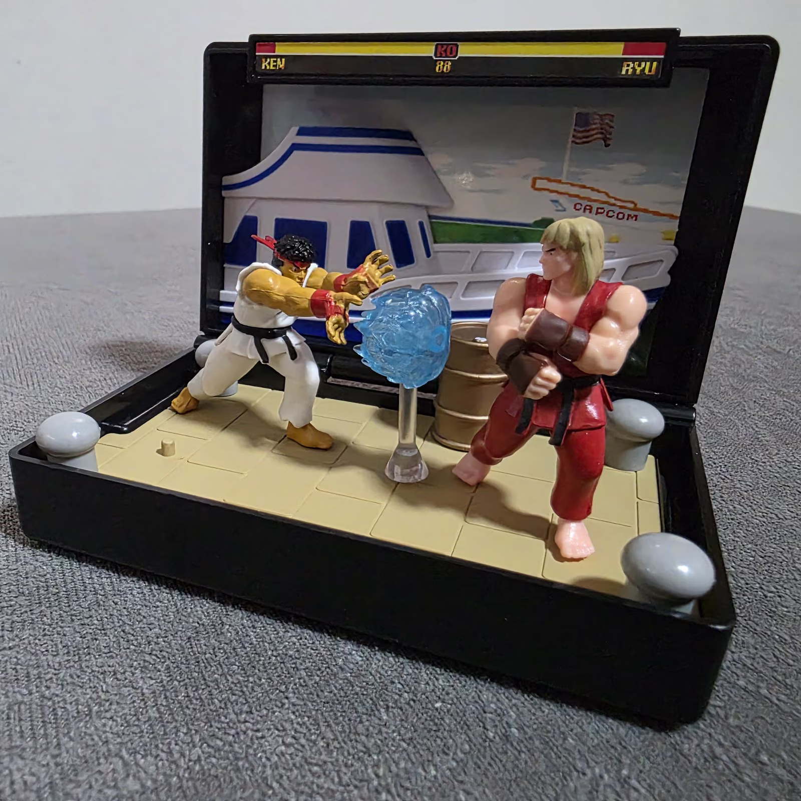 Miniatura de luta em uma coleção de games
